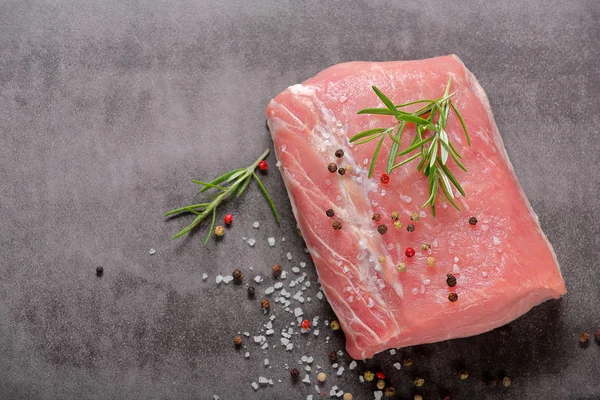Raw pork loin with spices