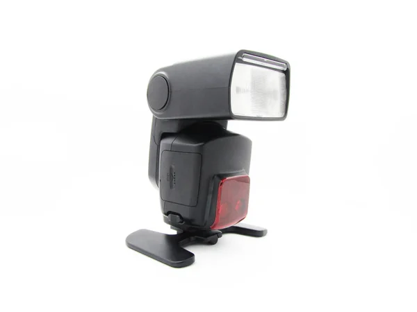 Flash for the camera with an adjustable head — Stock Photo, Image