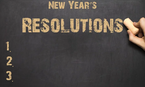 New Year's resolutie op het bord geschreven woord — Stockfoto