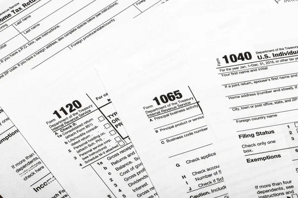 1040,1120,1065 US tax form / beskattning koncept — Stockfoto