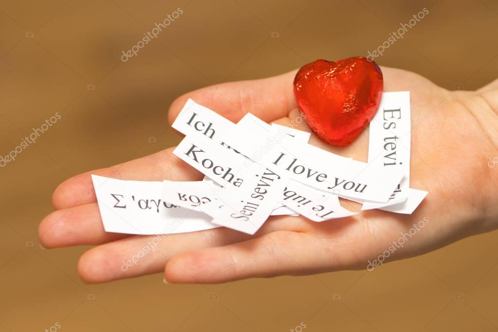 I Love You. The words, printed on paper in different languages o