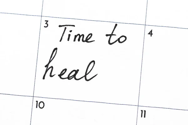 "tiempo para sanar "texto escrito en el calendario — Foto de Stock