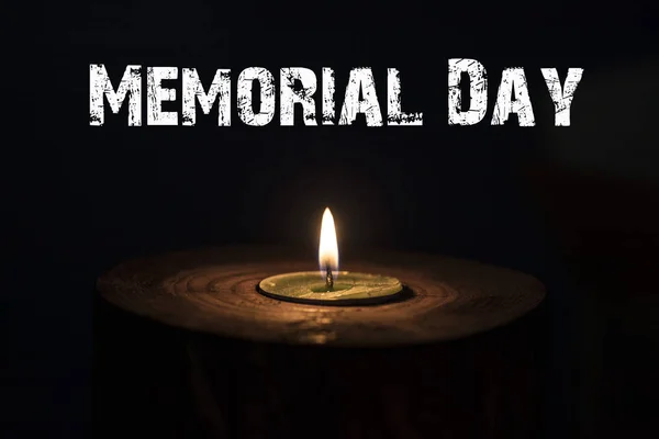 Memorial day, inscription on black background and candle — Stock Photo, Image