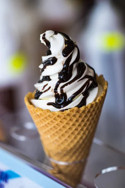 Preparation of ice cream in a waffle cup — Stock Photo, Image