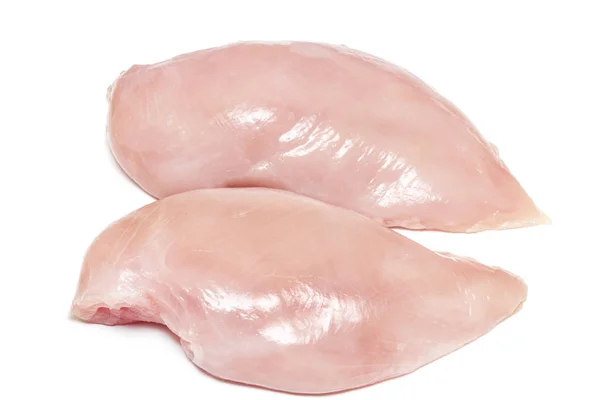 Dois peitos de frango cru fresco no fundo branco — Fotografia de Stock