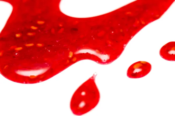 Gerimis selai raspberry terisolasi pada latar belakang putih dari tampilan atas — Stok Foto
