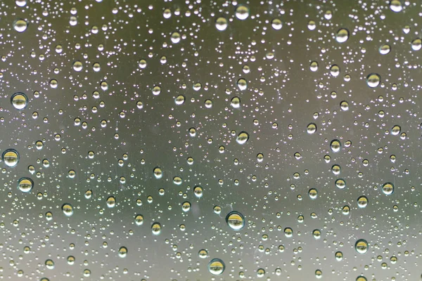 Water drops on glass after rain background — Stock Photo, Image