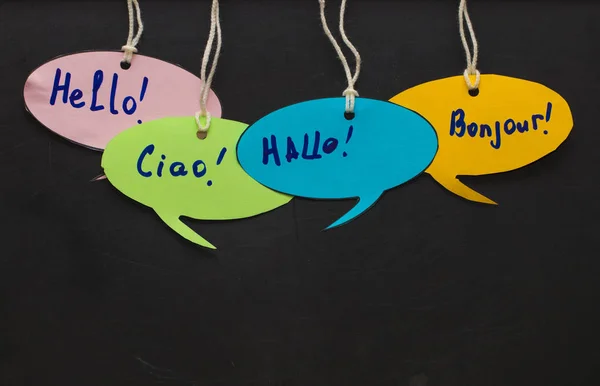 Bonjour / Parler des langues étrangères. bulle de parole colorée — Photo