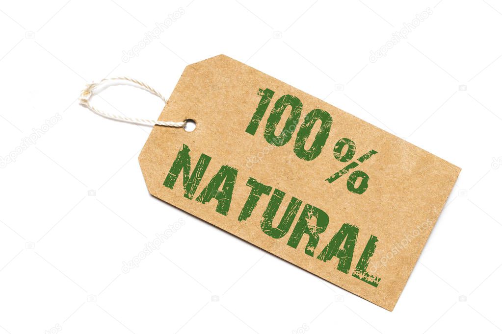 one hundred percent natural sign - a paper price tag on a white 