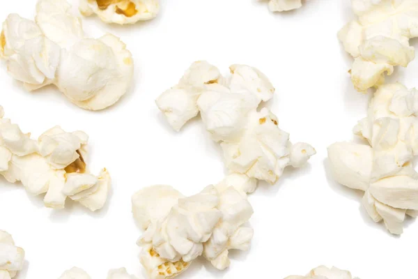 Popcorn izolovaných na bílém pozadí. Closeup — Stock fotografie