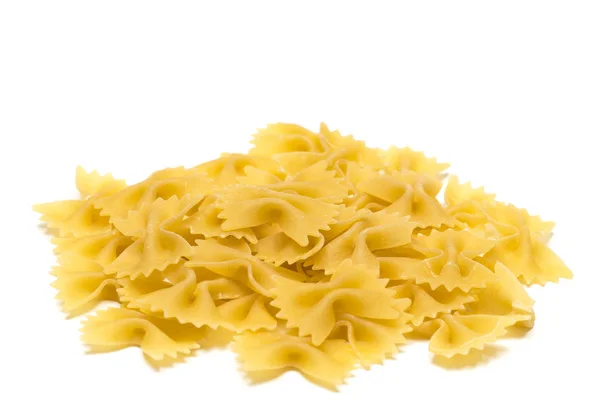 Heap of  bow tie pasta isolated on white background — Stock Photo, Image