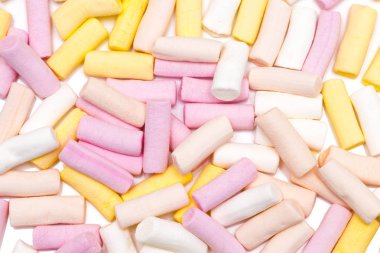 Marshmallow. Arka plan veya renkli mini lokum dokusuna