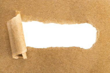 holes in brown paper with torn sides over paper background with  clipart