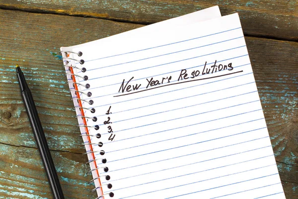 New Year's Resolution written on a notepad and pen. New Year res — Stock Photo, Image