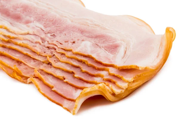 Skivad bacon isolerad på vit bakgrund cutout — Stockfoto