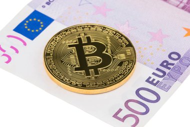 Euro para birimi zemin üzerine altın Bitcoin yakın çekim.