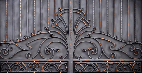 magnificent wrought-iron gates, ornamental forging, forged eleme