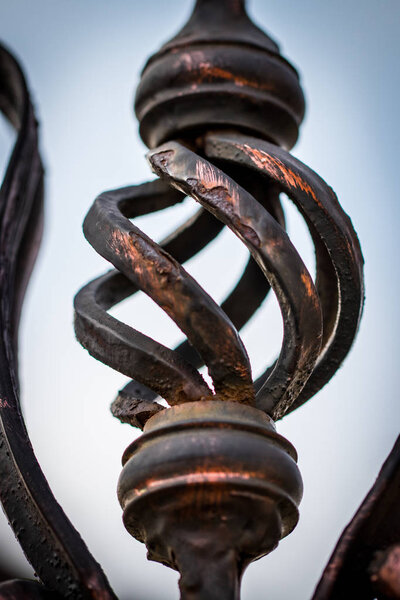 decorative parts of metal gates, elements of hand forging
