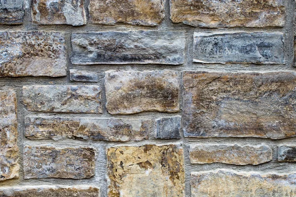 abstraction wall fence built of natural stone background