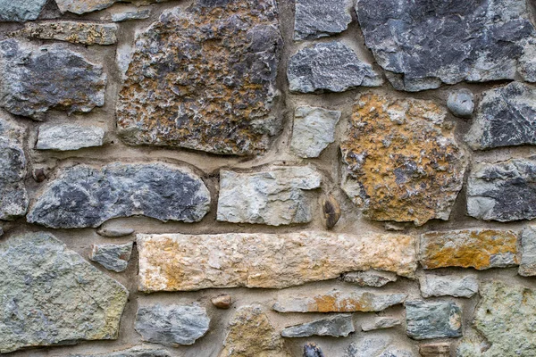 abstraction wall fence built of natural stone background