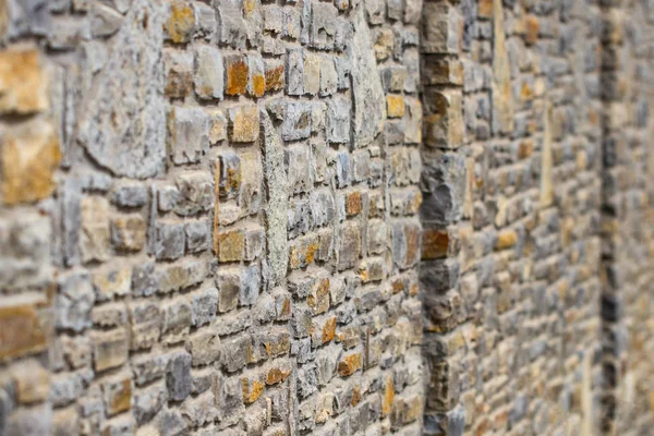 Soyut duvar çitleri doğal taştan yapılmış. — Stok fotoğraf