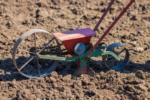 Vintage hand-made grain planter in the village — Stock Photo, Image