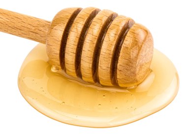 Beyaz arka planda bal damlaması izole edildi