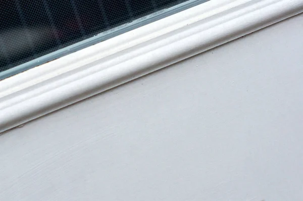 Κοντινό πλάνο της βαμμένο λευκό πλαίσιο πορτών και παραθύρων — Φωτογραφία Αρχείου