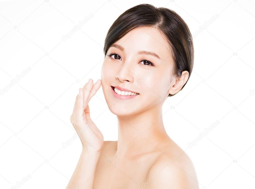 closeup   young  woman smiling face with clean  skin