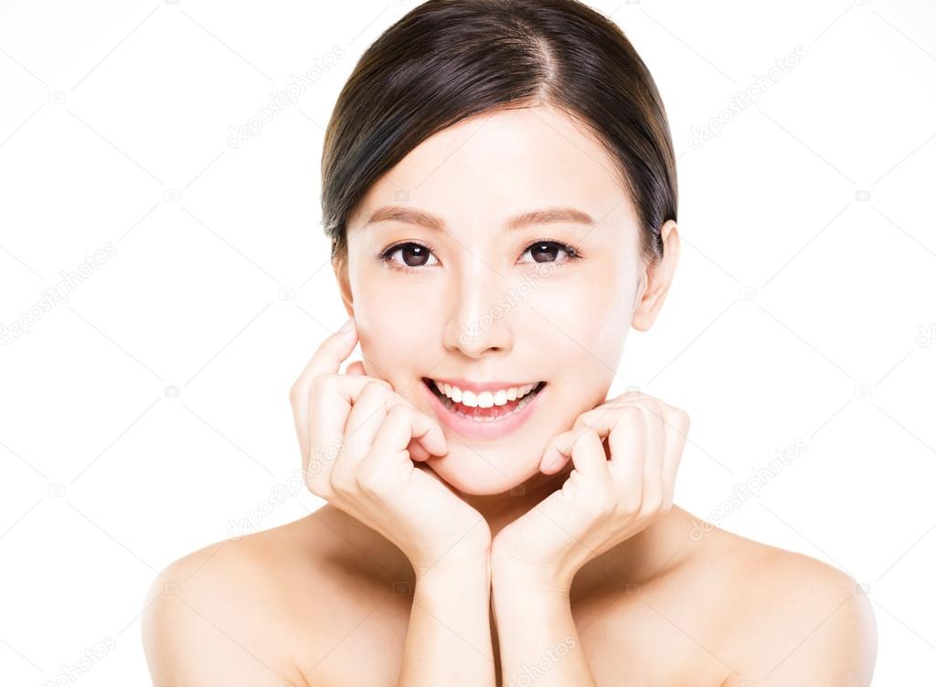 closeup   young  woman smiling face with clean  skin
