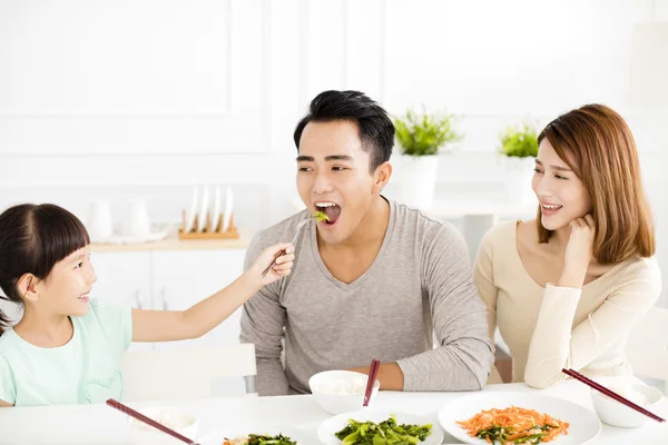 Happy young Family enjoy their dinner — Stock fotografie