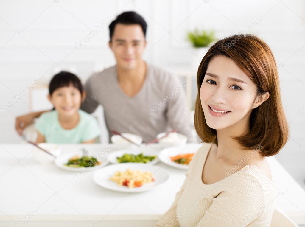 happy asian young Family enjoy their dinner