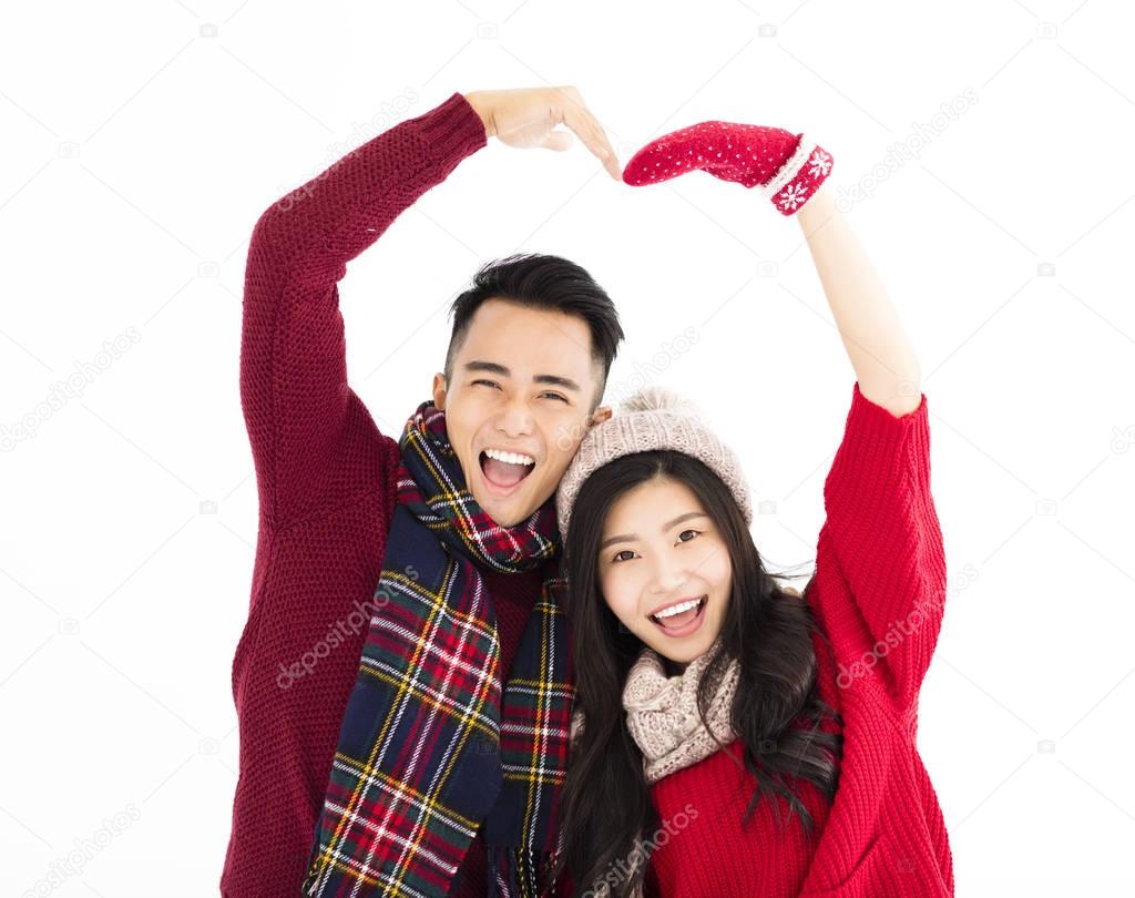 happy couple in winter wear with lovely gesture