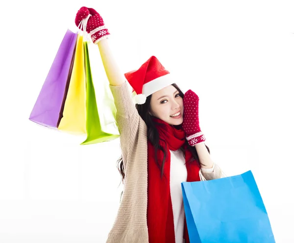 Gelukkig jonge vrouw geniet van het winkelen van Kerstmis — Stockfoto