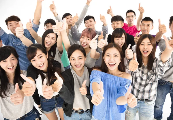 Vista superior de grupo jovem feliz com polegares para cima — Fotografia de Stock