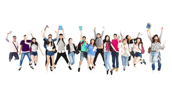Jonge student groep mensen geïsoleerd op wit springen — Stockfoto