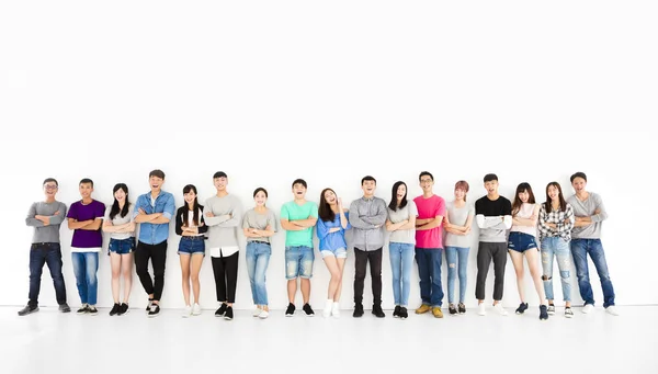 Happy young student group  standing together Royalty Free Stock Photos