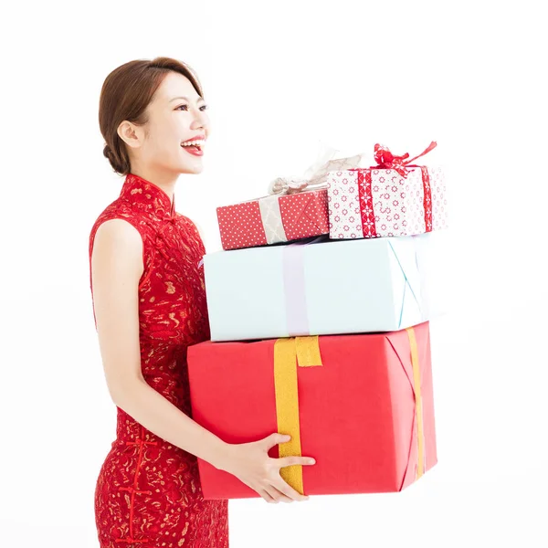 Happy chinese new year. young woman holding gift box — Stock Photo, Image