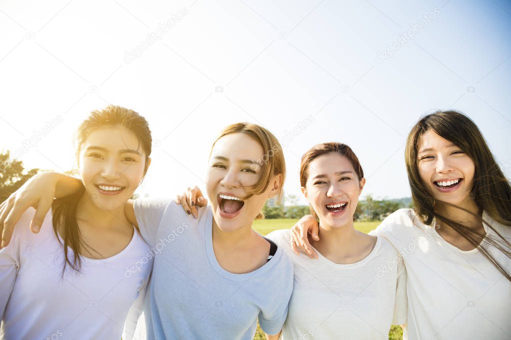 Group of young beautiful women smiling
