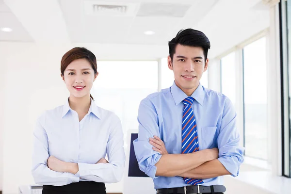Young Business people standing in office — Stock Photo, Image