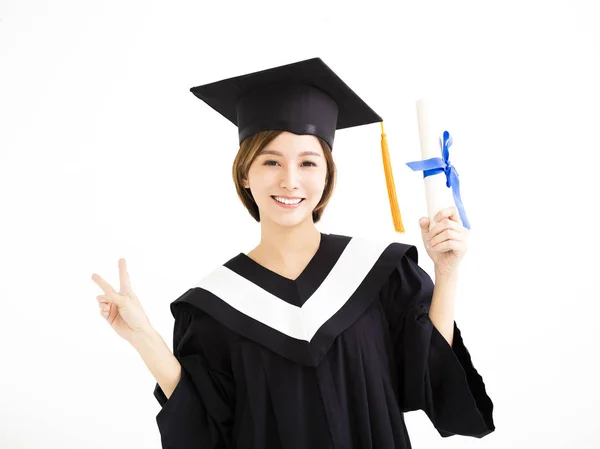 Bela jovem asiático graduado segurando diploma — Fotografia de Stock