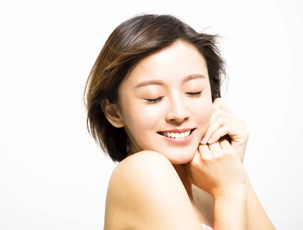 Smiling  young Woman with hair motion Stock Photo