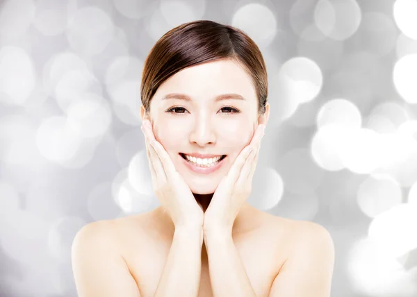 Closeup   young  woman face with blur background — Stock Photo, Image