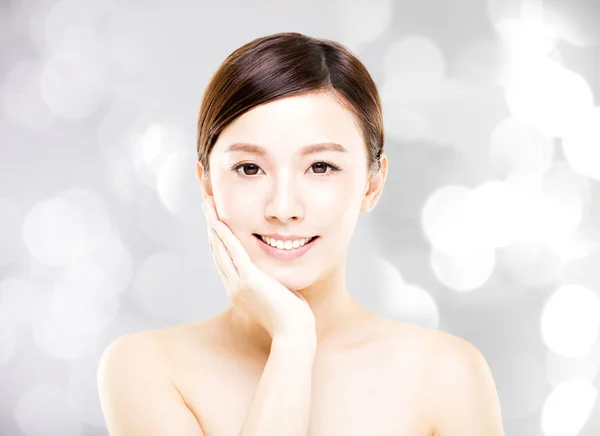 Closeup   young  woman face with blur background — Stock Photo, Image