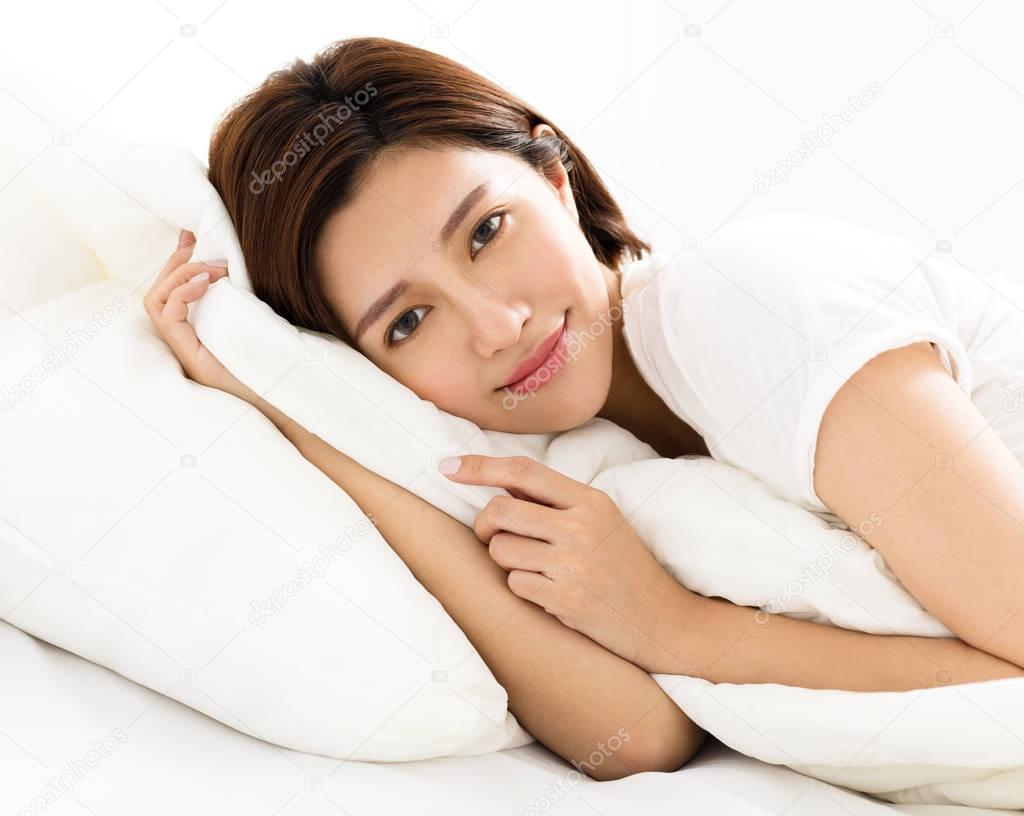 young beautiful woman sleeping in the bed