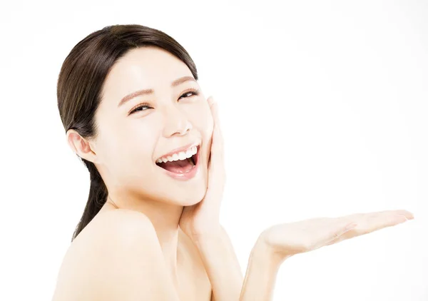 Beauty woman showing  beauty product on hand — Stock Photo, Image