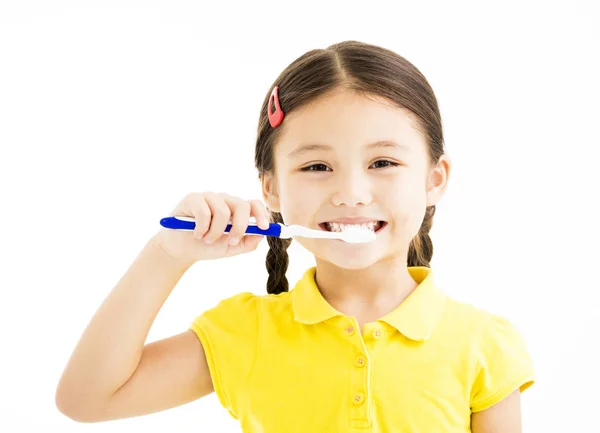 Feliz niña cepillarse los dientes —  Fotos de Stock