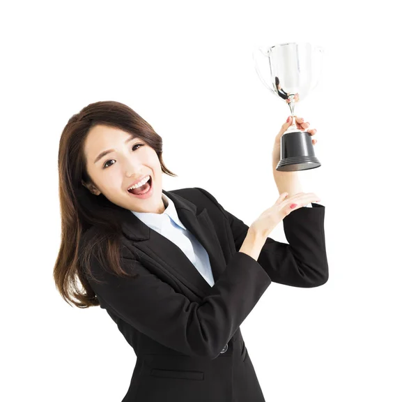 Щаслива молода бізнес-леді показує трофей — стокове фото