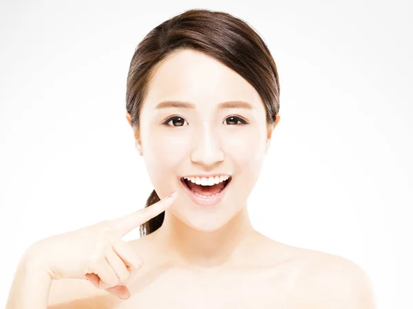 Closeup beautiful young woman face with tooth — Stock Photo, Image