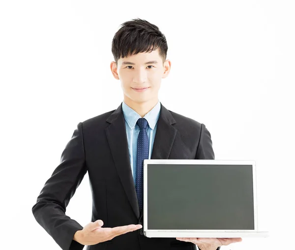 Boldog fiatal üzletember gazdaság laptop — Stock Fotó